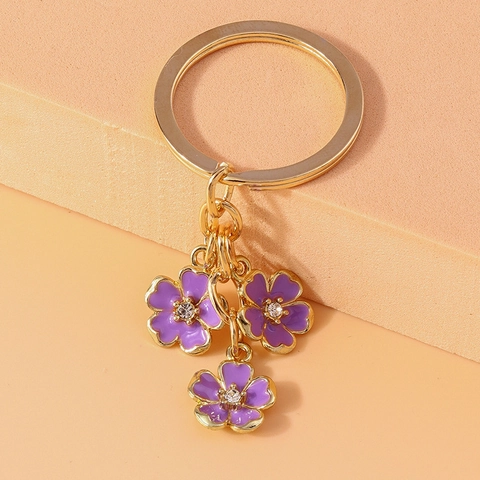 Elegante Llavero de Flor de Esmalte Aleación Chapada en Oro Flor de Cerezo Anillo Con Centro de Diamantes de Imitación Colgante para Bolso Regalo Mujer