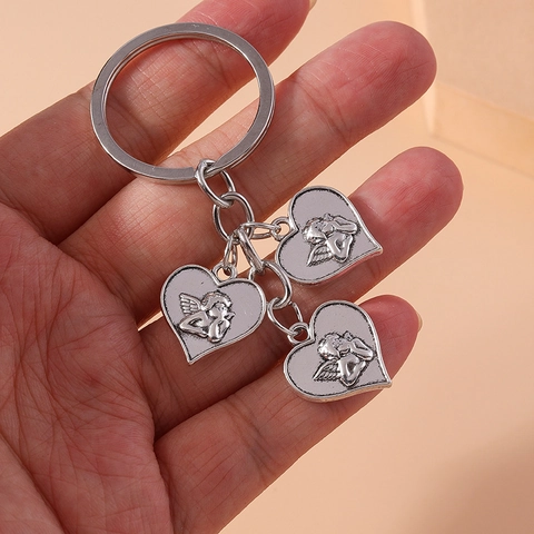 Portachiavi Vintage in Lega di Zinco con Cuore Angelo e Ciondolo a Rilievo Cupido per Zaino da Donna Borsa Decorazione