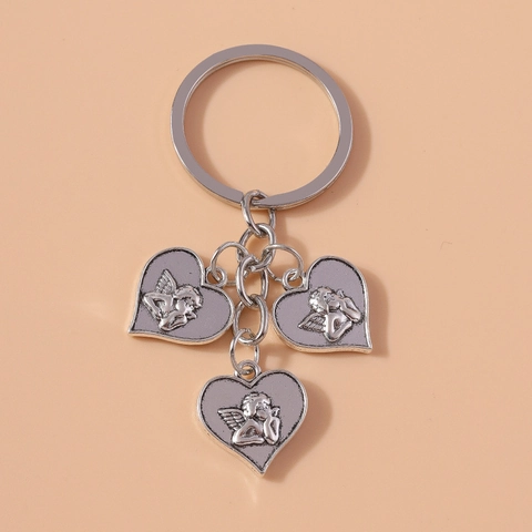 Portachiavi Vintage in Lega di Zinco con Cuore Angelo e Ciondolo a Rilievo Cupido per Zaino da Donna Borsa Decorazione
