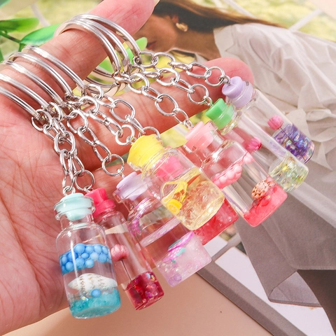 Llavero Creativo de Mini Botella a la Deriva Con Flores Secas Caracola Colgante de Líquido Llavero de Aleación para Bolso Regalo Mujer