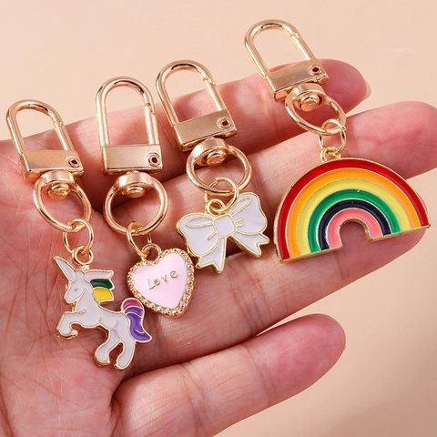 Simpatico Portachiavi Smaltato a Forma di Unicorno Arcobaleno Cuore Fiocco in Lega di Zinco Pendente per Borsa per Donna Ragazza