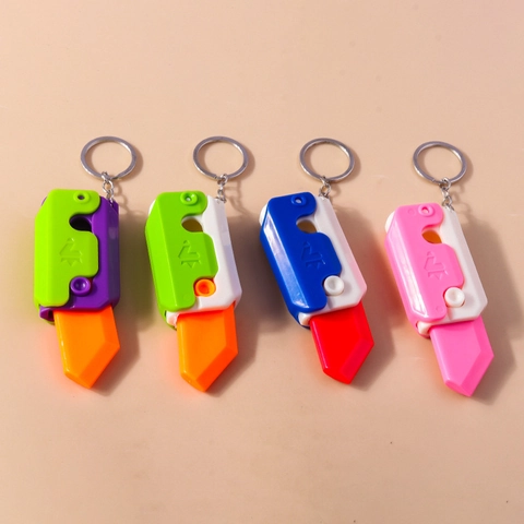 Mini Gravity Radish Knife Keychain Stress Relief Toy Retractable Plastic Pendant For Kids Adults Backpack Accessory