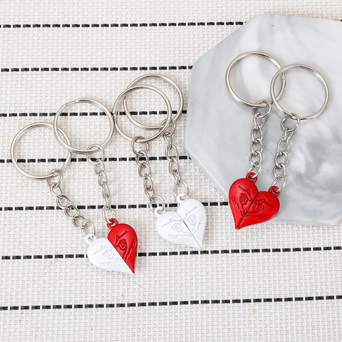 Portachiavi per Coppia Creativo con Cucitura a Cuore in Lega di Zinco Smalto Magnetico Puzzle Portachiavi Charm Borsa San Valentino