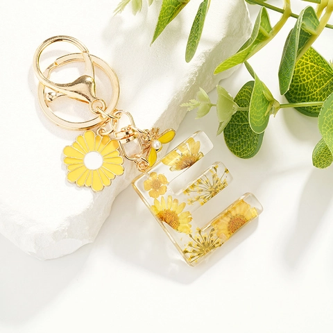 Portachiavi con Lettera in Resina Fatto a Mano Con Veri Fiori Secchi Gialli Lega Oro Margherita Ape Ciondolo per Donna
