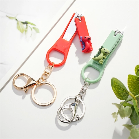 Schattige Cartoon Dinosauriër Nagelknipser Sleutelhanger Creatieve Flesopener Metalen Sleutelring Voor Mannen Vrouwen Koppel Mode Cadeau