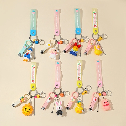 Cartoon Dier Multifunctionele Nagelknipper Oorreiniger Sleutelhanger Met Siliconen Band Draagbare Persoonlijke Verzorging Tool Decor