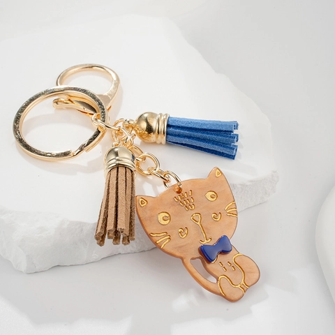 Franse Stijl Amber Kat Sleutelhanger Met Blauwe Strik En Dubbele Kwastjes Schattige Hars Dier Tas Hanger Voor Dames