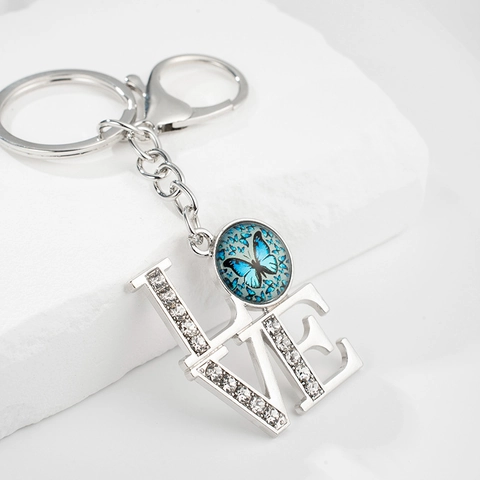 Porte-clés Lettres LOVE Strass Papillon Bleu Gemme du Temps Alliage Anneau Porte-clés Pendentif de Sac Mode Cadeau Bijoux Femme Homme