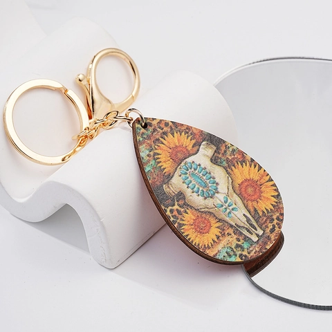 Portachiavi Western Bohemien Teschio di Toro Girasole Stampa Leopardata Metallo Ciondolo Anello Chiave retrò Testa di Mucca