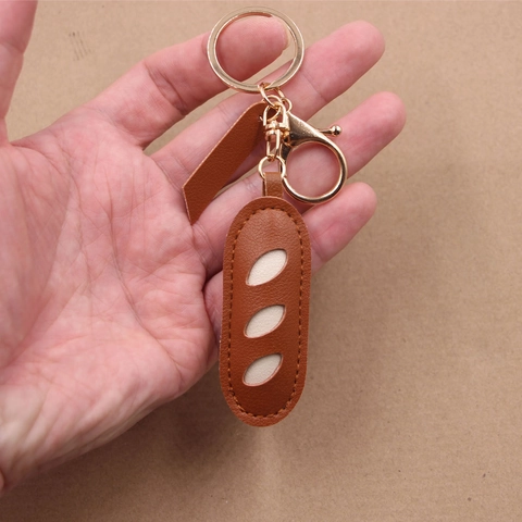 Creativo Portachiavi a Forma di Pane Baguette in Similpelle Pendente per Borsa Portachiavi Auto in Metallo Dorato Accessori