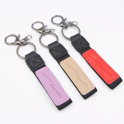 Llavero de Cuero y Lona Advance Bravely Letras Grabadas Correa Trenzada Anillo de Llave Gancho de Metal para Decoración de Bolsos Carteras