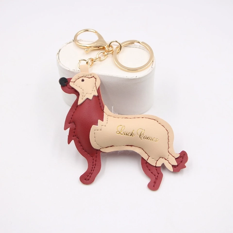 Lindo Llavero de Cuero de Perro 3D Luck Comes Estampado en Oro Colgante de Bolso para Mujer Accesorios de Mochila Regalo