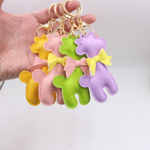 Süßer PU Leder Giraffe Schlüsselanhänger Mit Satin Schleife Saffiano Textur Tierform Tasche Anhänger Auto Schlüsselring Für Damen Mädchen