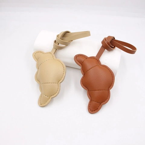 Ciondolo Creativo per Borsa a Forma di Pane di Simulazione Ciondolo Croissant in Pelle PU Impunturata Grazioso Ornamento Appendibile Per Borse Zaini Accessori