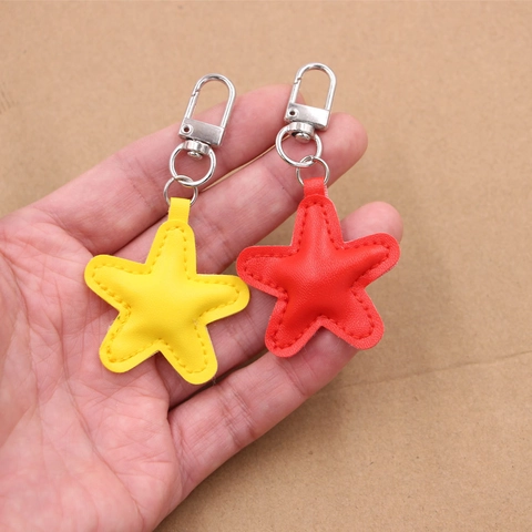 Mini Porte-clés en Cuir PU Étoile pour Femmes Pendentif de Sac à la Mode Forme d'Étoile Avec Détail de Couture Accessoire