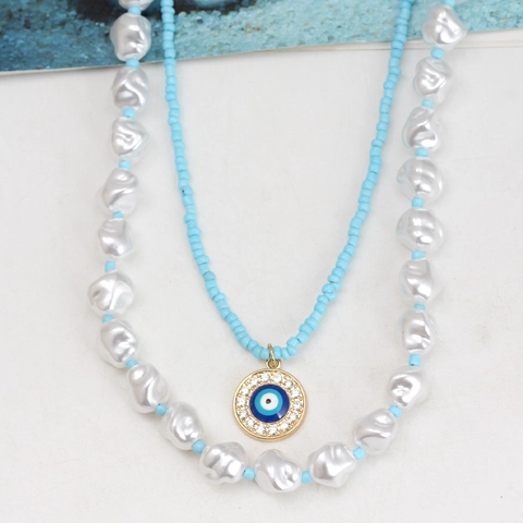 Collana di Perline Malocchio Bohémien Pendente in Rame Perla Artificiale Mano di Fatima Perline Colorate Collana per Donna Gioielli