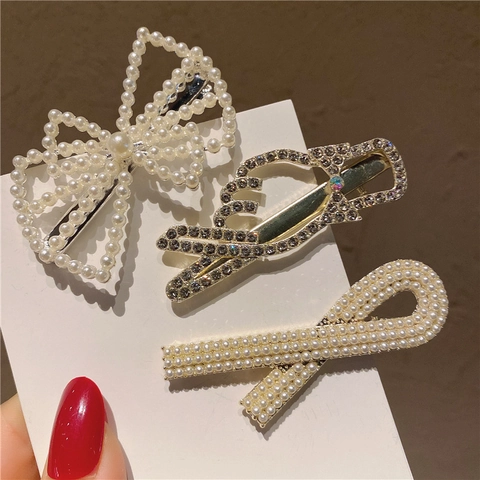 Elegantes Künstliche Perlen Strass Haarspangen Set Für Damen Schleife Flügel Form Gold Legierung Haarnadel Zubehör Für Hochzeit Party