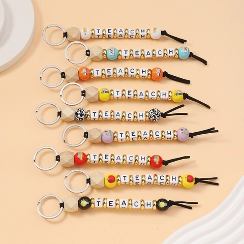 Portachiavi con Perline Alfabeto Teach con Nappina in Legno Regalo Creativo per l'Apprezzamento dell'Insegnante Anello Portachiavi a Tema Scolastico per Donne