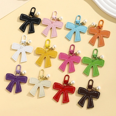 Süßer PU Leder Schleife Schlüsselanhänger Mit Künstliche Perlen Strass Anhänger Mode Stitching Bow Tasche Charme Für Damen Mädchen Geschenk