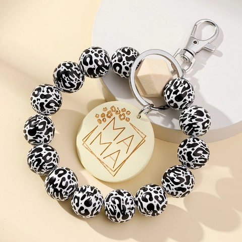 Bohemian Leopardenmuster Holzperlen Schlüsselanhänger Mama Runder Anhänger Legierung Karabinerverschluss Mode Tasche Charm