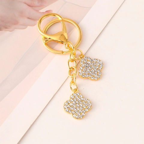Porte-clés Trèfle à Quatre Feuilles en Acier Inoxydable Incrusté de Strass Pendentif de Sac Trèfle de Chance Cadeau Bijou Femme