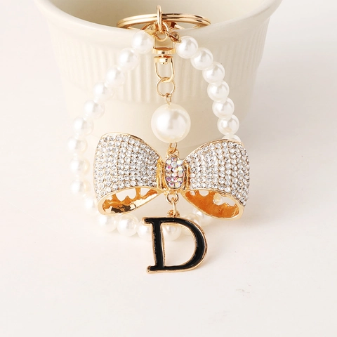Llavero Elegante de Lazo y Perla Artificial Con Letra D Strass Colgante de Bolso de Aleación Para Accesorios de Moda Mujer