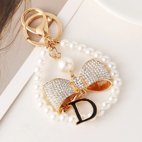 Llavero Elegante de Lazo y Perla Artificial Con Letra D Strass Colgante de Bolso de Aleación Para Accesorios de Moda Mujer