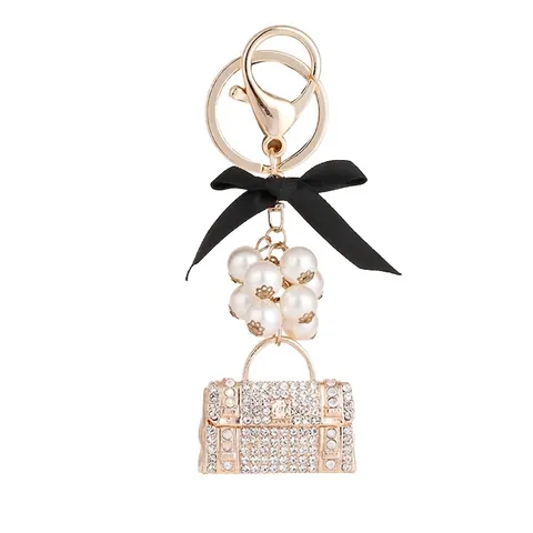 Llavero de Bolso con Diamantes de Imitación de Lujo con Perla Artificial Sintética y Lazo de Satén Negro Colgante de Metal Dorado para Mujer