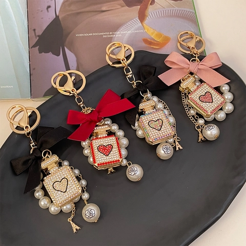 Luxury Perfume Bottle Bow Keychain For Women Elegant Artificial Pearl Rhinestone Heart Pendant Bag Hanging Decoration Gift