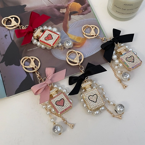 Luxury Perfume Bottle Bow Keychain For Women Elegant Artificial Pearl Rhinestone Heart Pendant Bag Hanging Decoration Gift