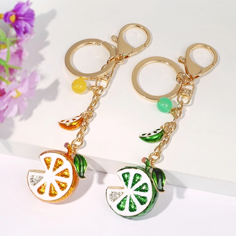 Kreativer Legierung Strass Frucht Zitrone Orange Scheibe Schlüsselanhänger Emaille Tasche Anhänger Für Damen Geschenk