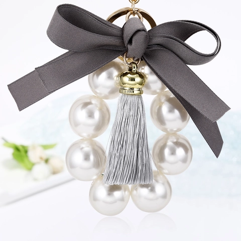 Eleganter Zinklegierung Künstliche Perle Schleife Quaste Schlüsselanhänger Damen Tasche Anhänger Schmuck Zubehör Geschenk