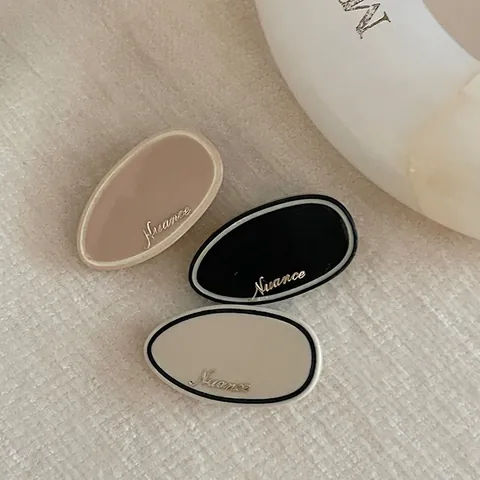 Fermaglio per Capelli Ovale in Acetato Stile Coreano Semplice Vintage Fermaglio a Becco d'Anatra Con Scritta Dorata Nuance Donna