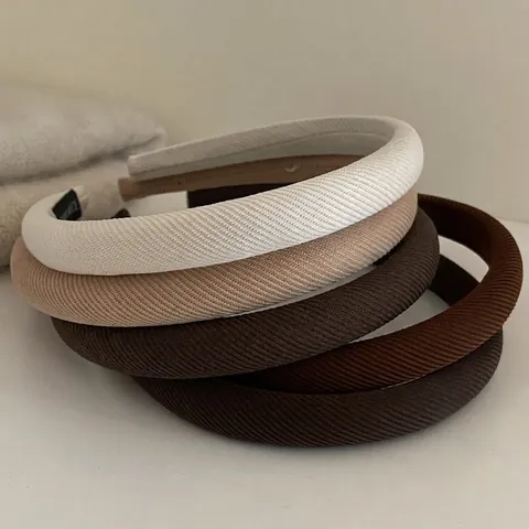 Damen Gepolstertes Schwamm Stirnband Gerippter Stoff Einfarbig Hoch Kraniale Kopfbedeckung Eleganter Minimalistischer Haarschmuck