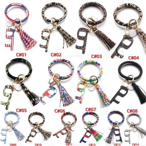 Portachiavi da Polso in Pelle PU Con Nappina e Strumento Apriporta Senza Contatto Portachiavi Bracciale Moda Maculato per Donna