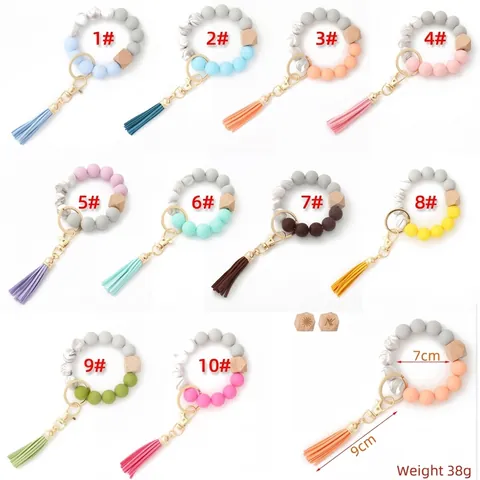 Porte-clés Bracelet en Silicone Perlé Avec Pompon et Perle en Bois Bracelet Bohème Porte-clés Tendance Pour Femmes Filles