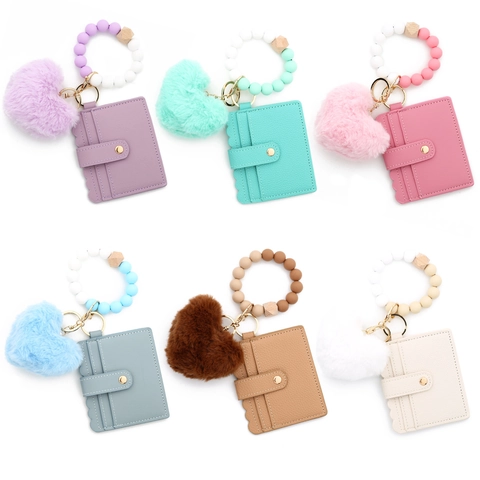 Portachiavi da Polso con Perline in Silicone Con Pompon a Cuore Portacarte in Pelle PU per Donna Bracciale Bordo a Onde