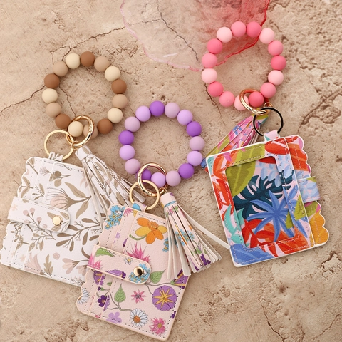 Llavero de Pulsera de Cuentas de Silicona Con Tarjetero de Cuero PU Estampado Floral Lazo Borla Cartera de Muñeca Mujer