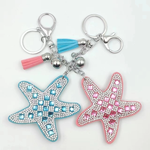Llavero de Estrella de Mar con Strass para Mujer Colgante de Bolso de Terciopelo Coreano con Borla y Cascabel Estrella de Mar Joyería