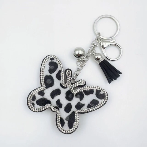 Llavero de Mariposa con Estampado de Leopardo y Diamantes de Imitación de Piel Sintética con Borla de Cuero Negro para Mujer