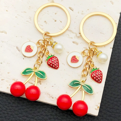 Portachiavi Creativo in Resina 3D Ciliegia Fragola Rossa Ciondolo Frutta Oro KC Con Perla Artificial Per Borsa Donna Portachiavi Auto Accessorio