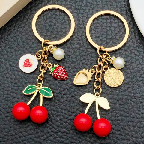 Portachiavi Creativo in Resina 3D Ciliegia Fragola Rossa Ciondolo Frutta Oro KC Con Perla Artificial Per Borsa Donna Portachiavi Auto Accessorio