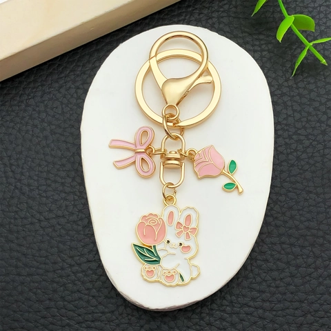 Porte-clés Lapin de Dessin Animé en Alliage de Zinc Pendentif Rose et Nœud Charme de Sac à Main pour Femmes