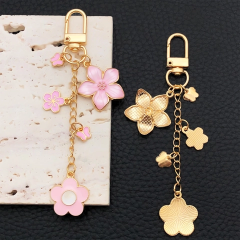 Portachiavi in Lega di Zinco Smaltato Con Fiori di Ciliegio e Farfalle Ciondolo Decorativo per Borsa Accessori Donna Rosa Blu