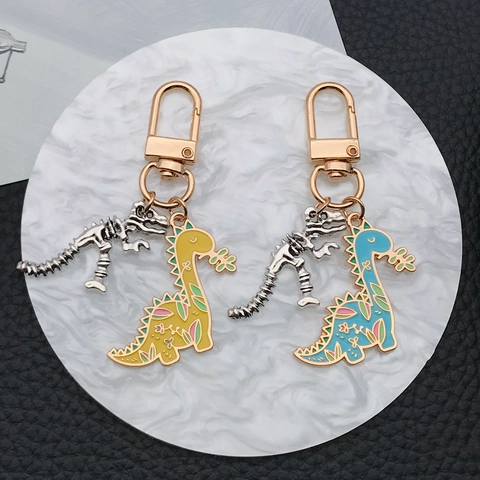 Süßer Cartoon Dinosaurier Emaille Legierung Schlüsselanhänger Doppelanhänger Skelett Dino Schlüsselring Für Auto Taschen Geschenk Für Damen Kinder
