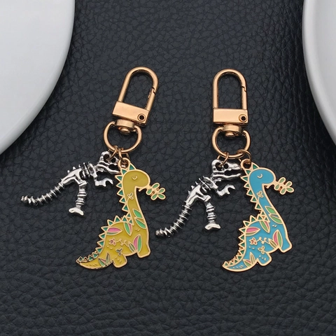 Süßer Cartoon Dinosaurier Emaille Legierung Schlüsselanhänger Doppelanhänger Skelett Dino Schlüsselring Für Auto Taschen Geschenk Für Damen Kinder