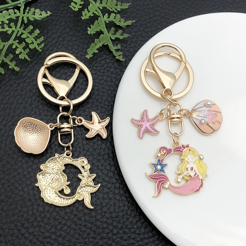 Llavero de Aleación de Sirena de Dibujos Animados Concha Estrella de Mar Oro Esmalte Adorno de Bolso Con Diamantes de Imitación Perla Artificial Tema Marino Joyería Mujer Regalo