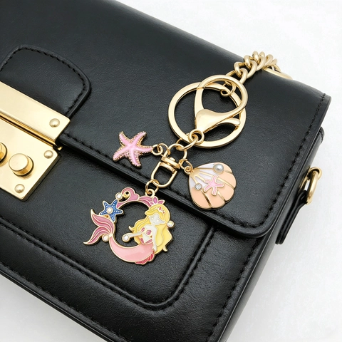 Llavero de Aleación de Sirena de Dibujos Animados Concha Estrella de Mar Oro Esmalte Adorno de Bolso Con Diamantes de Imitación Perla Artificial Tema Marino Joyería Mujer Regalo