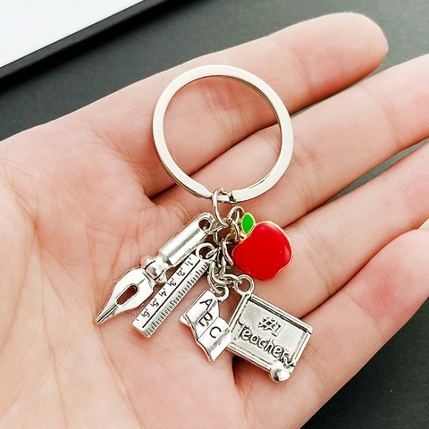 Porte-clés Créatif de Remerciement pour Enseignant Avec Pomme Rouge Règle Livre Plume de Stylo 1 Enseignant Papeterie Porte-clés Cadeau en Métal