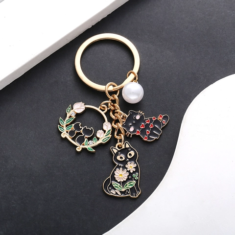 Portachiavi a Forma di Gatto Nero con Cuore e Corona di Fiori Lega di Zinco Smalto Ciondolo con Perla Artificiale per Borsa Gioielli